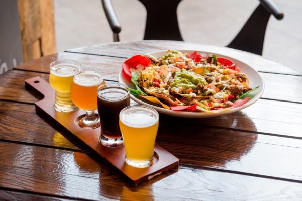 Tommy's Brewing Company - Craft beer flight in Trinidad with nachos