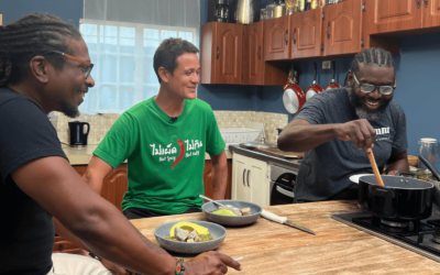 Mark Wiens with Baidawi of Eatahfood and David from D Market Movers, eating Callaloo in Trinidad and Tobago