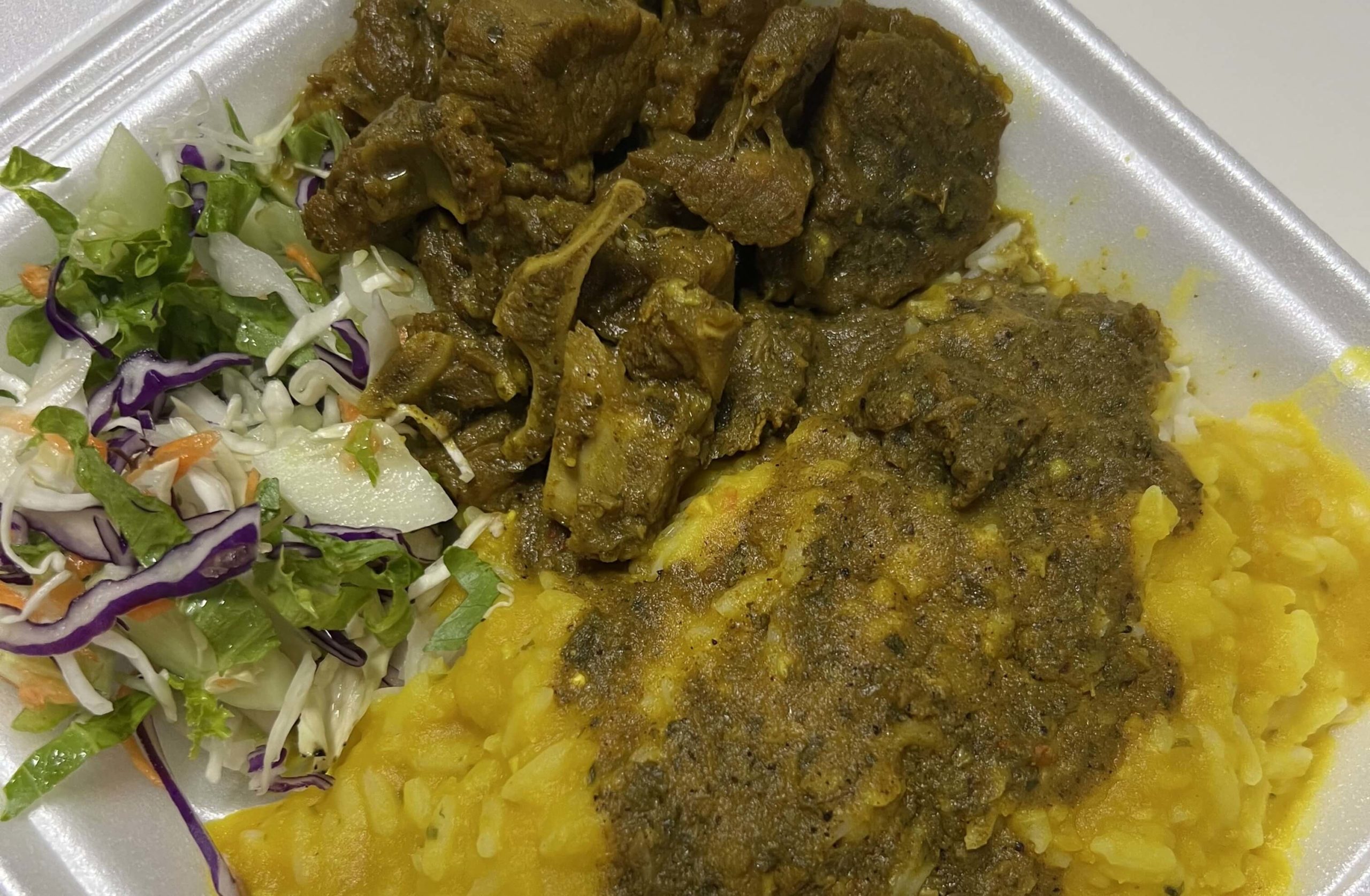 Curry goat, dhaal and rice from Sylvie's Roti Shop in San Juan, Trinidad from Mark Wiens
