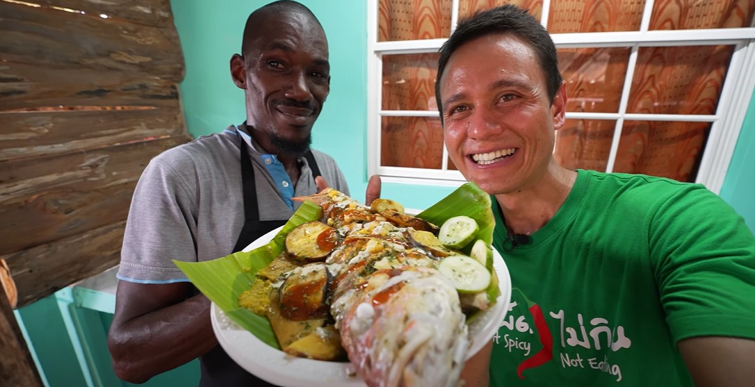 Mark Wiens with Dr Roast Fish in Mayaro